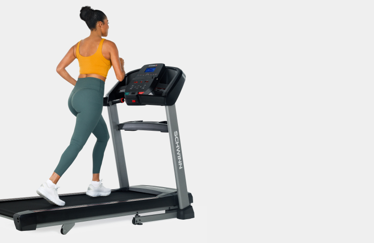 Woman running on a 815 treadmill